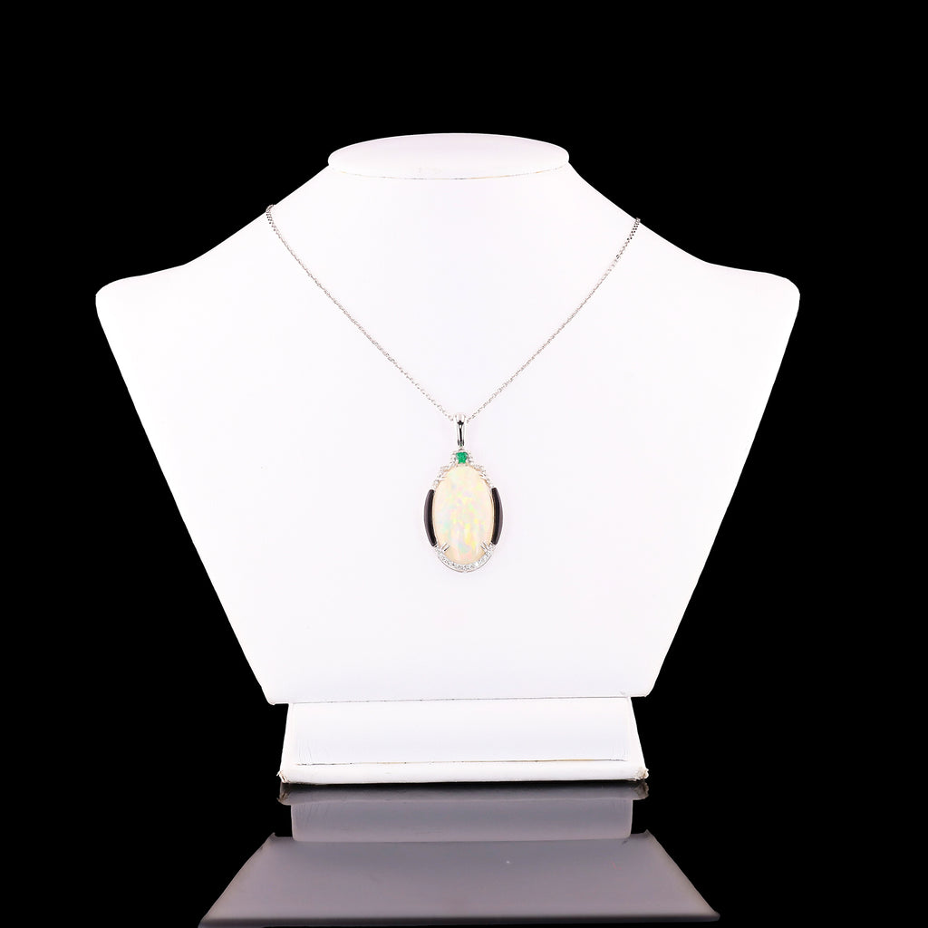14.11ct Opal, 0.14ct Emerald and 0.26ctw Diamond Platinum Ring