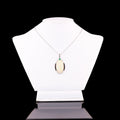 14.11ct Opal, 0.14ct Emerald and 0.26ctw Diamond Platinum Ring