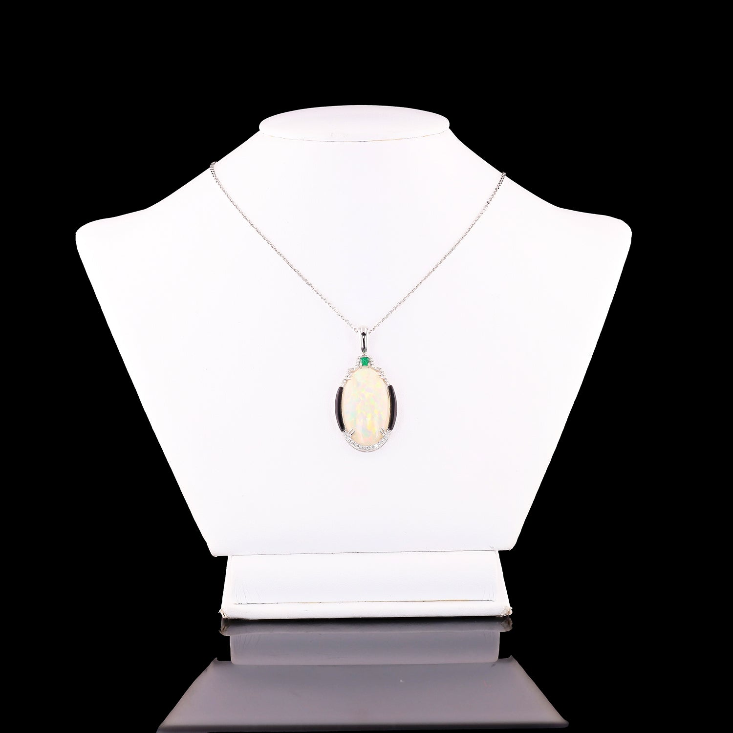 14.11ct Opal, 0.14ct Emerald and 0.26ctw Diamond Platinum Ring