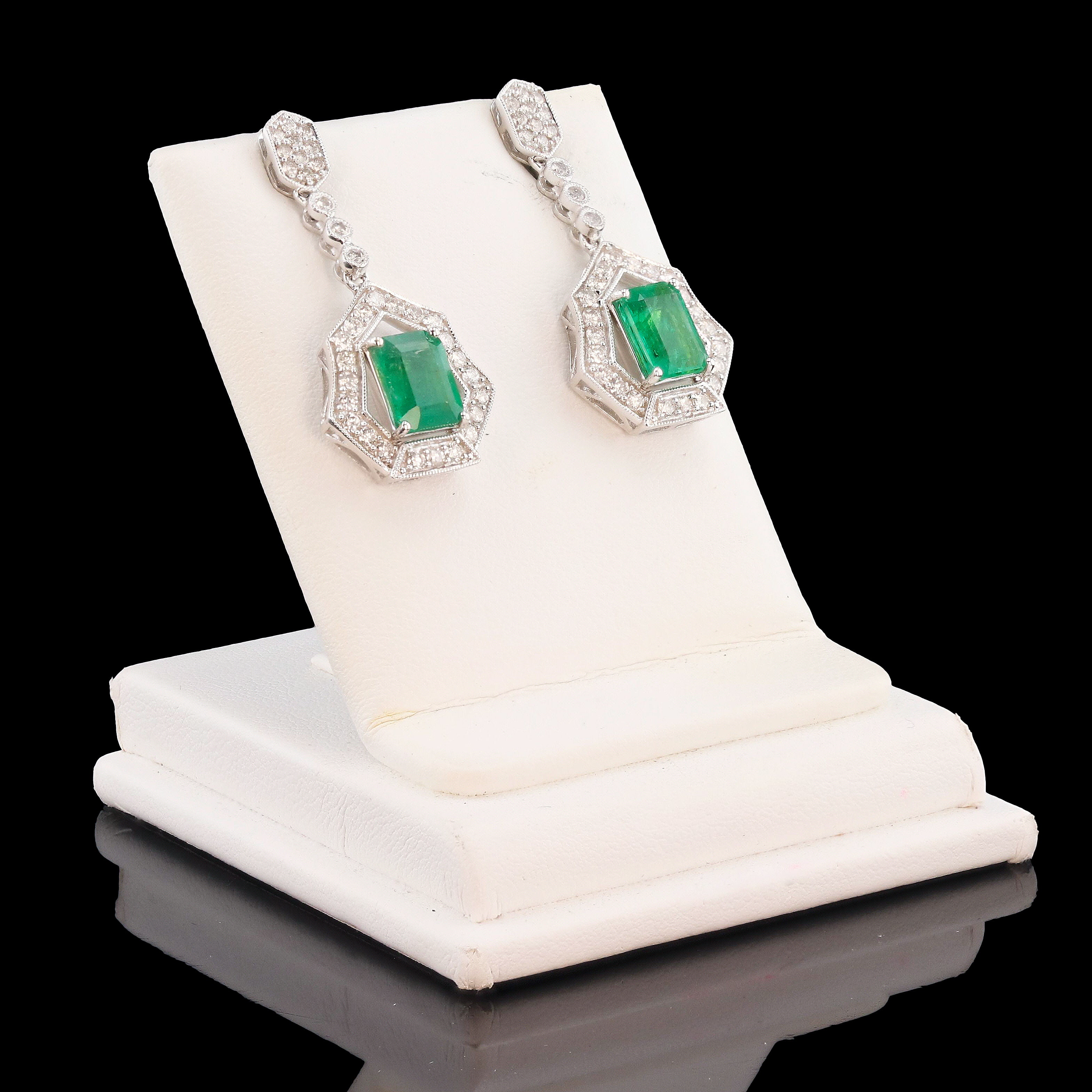 2.70ctw Emerald and 0.94ctw Diamond 18K White Gold Dangle Earrings