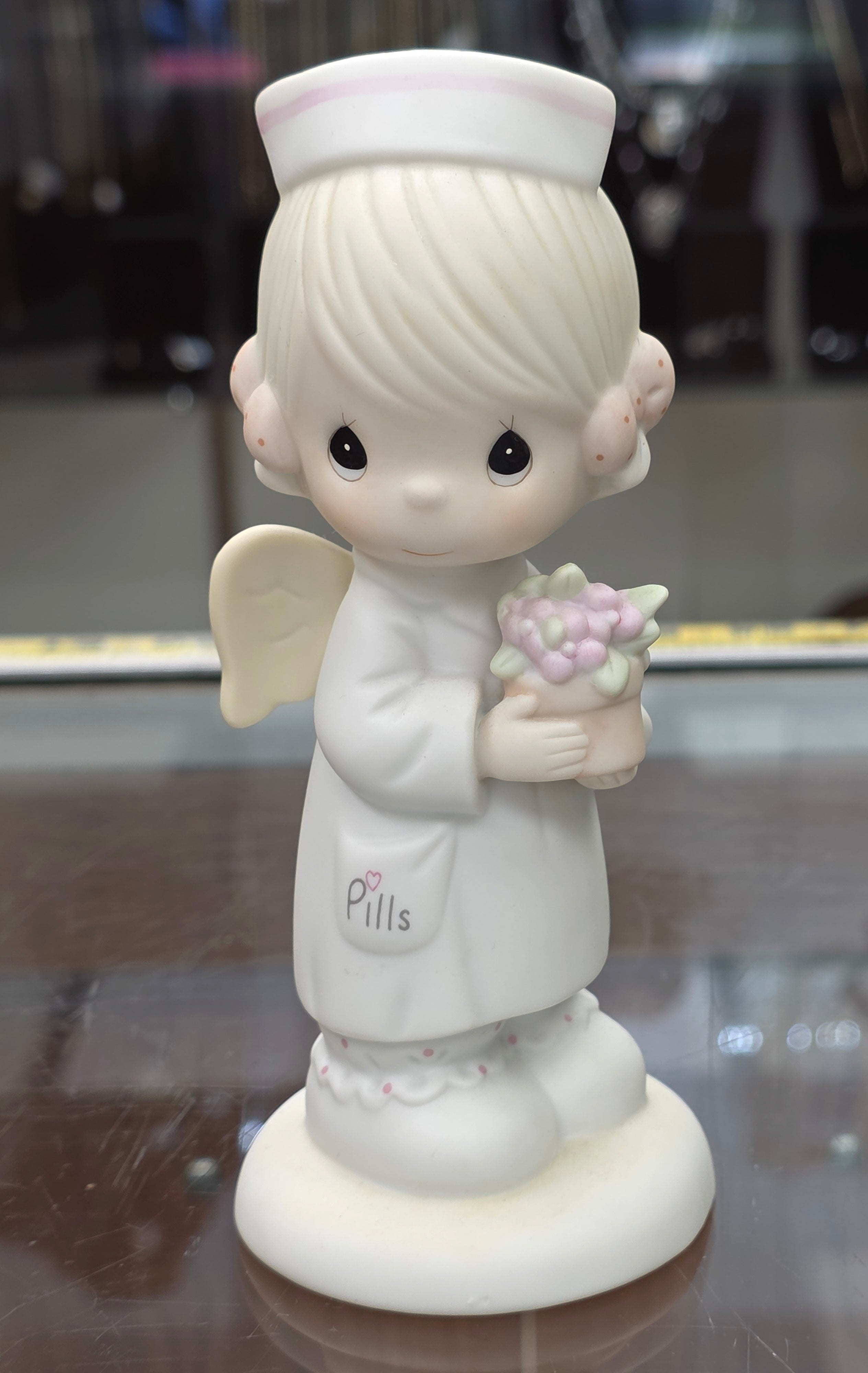 Precious Moments "Angel of Mercy"
