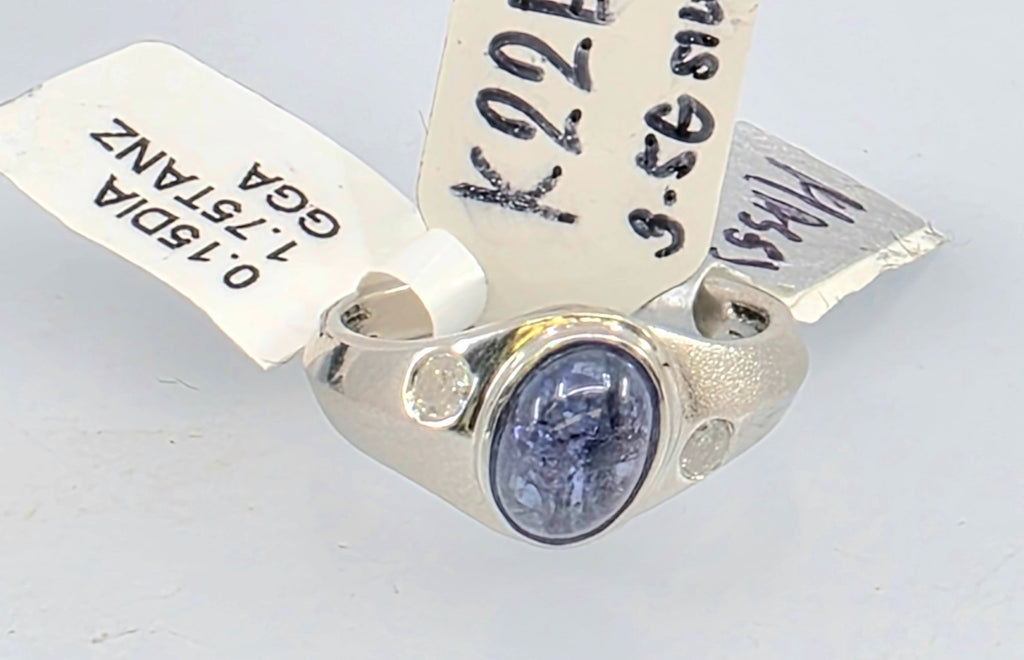 GGA Silver  1.75 ct Tanzanite and .15 Diamond Ring