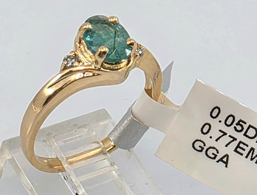 GGA Certified 0.77 Emerald and .05 Diamond Silver Ring