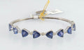 GGA certified 7.02 Tanzanite and .23 Diamond Silver Bracelet