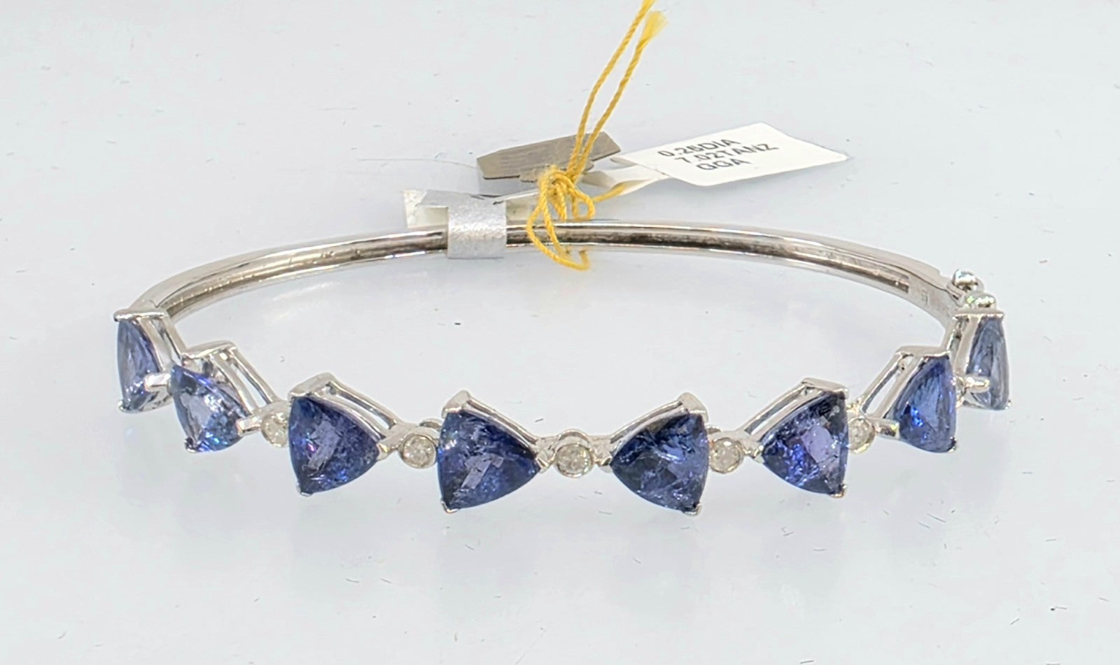 GGA certified 7.02 Tanzanite and .23 Diamond Silver Bracelet