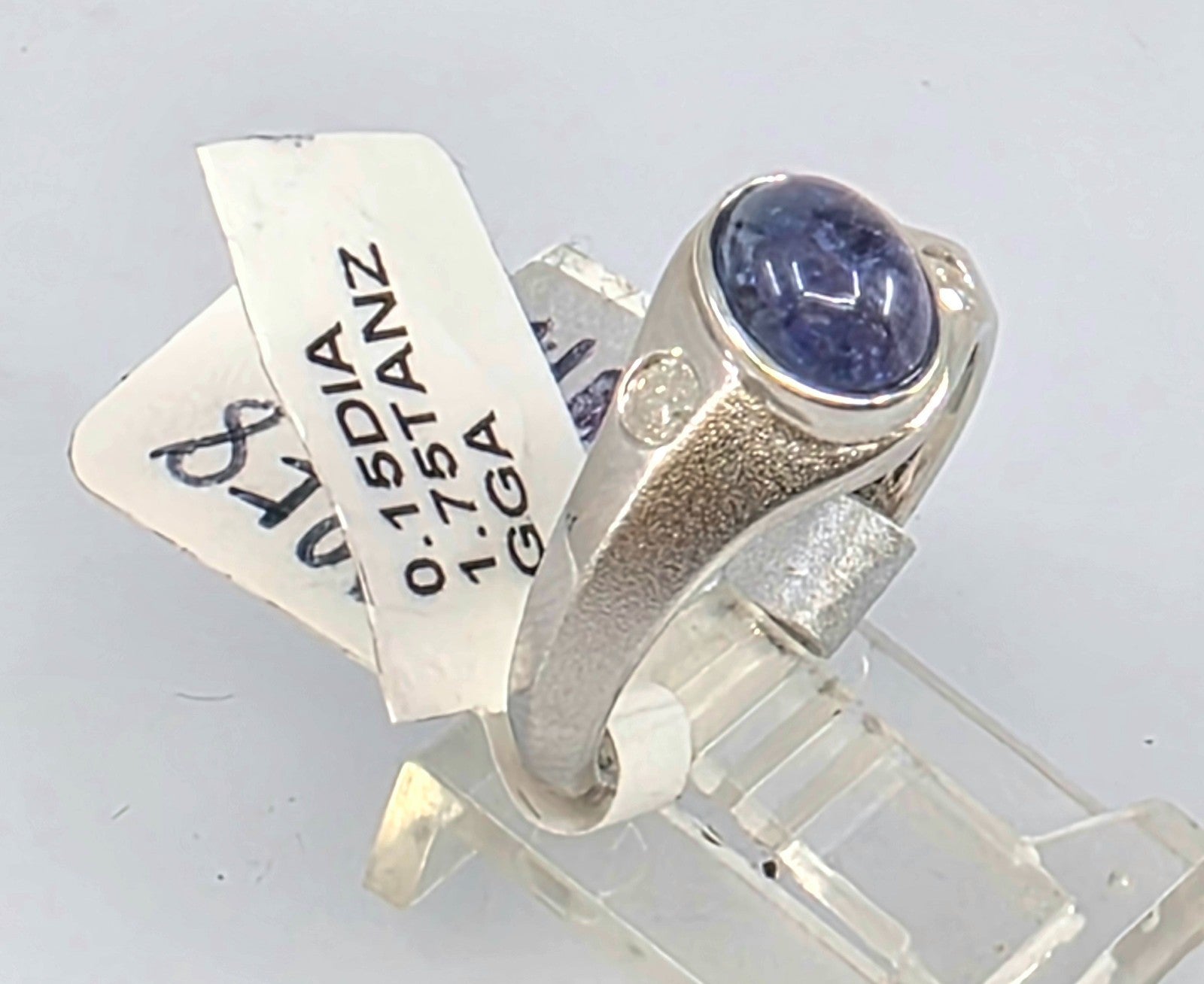 GGA Silver  1.75 ct Tanzanite and .15 Diamond Ring