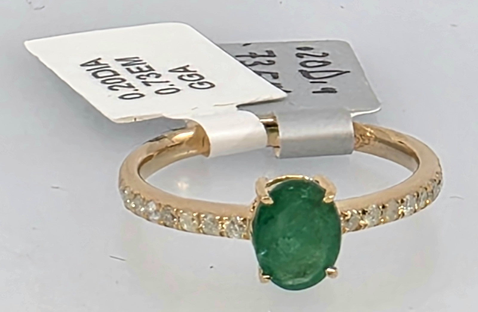 GGA Certified .73 Emerald and Diamond Silver Ring.