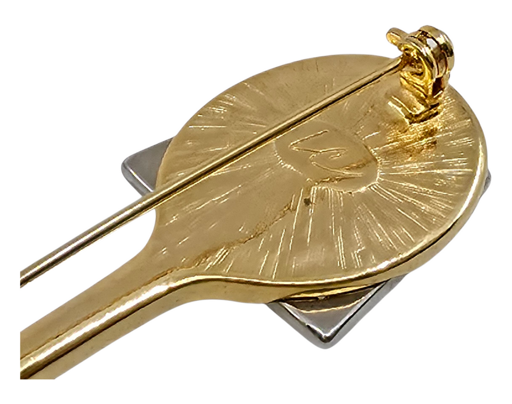 Liz Claiborne gold and silver tone tennis racket brooch pin with clear rhinestones.