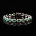 8.19ctw Emerald and 4.26ctw Diamond Platinum Bracelet