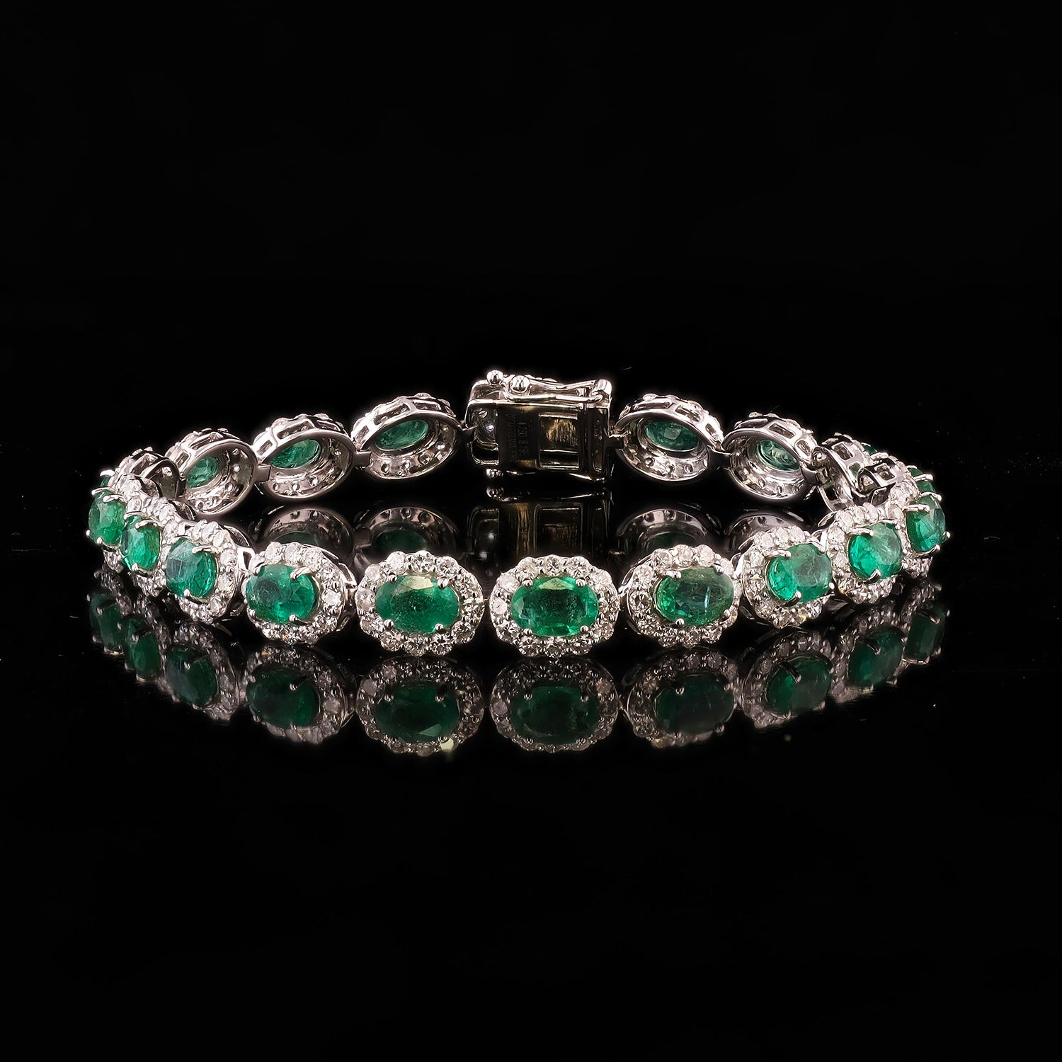 8.19ctw Emerald and 4.26ctw Diamond Platinum Bracelet