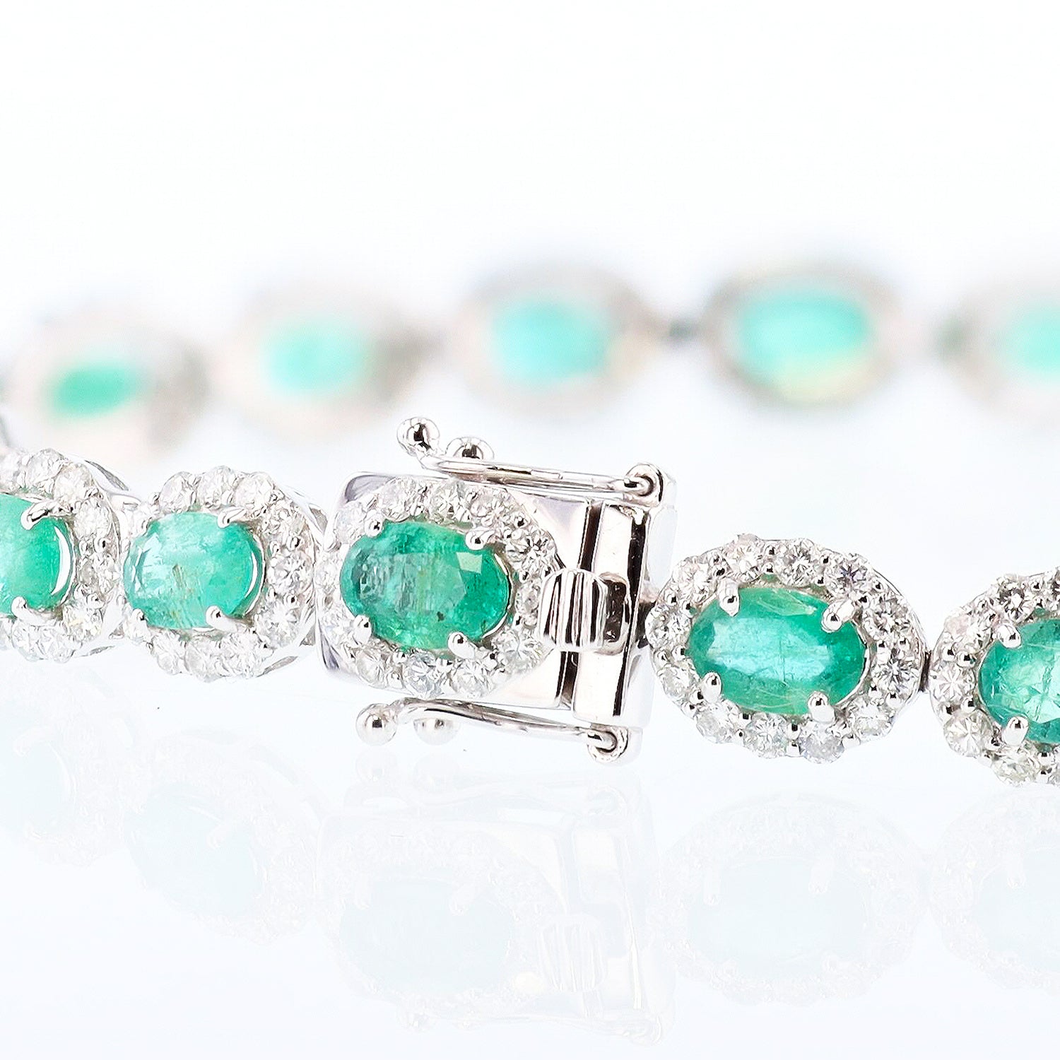 8.19ctw Emerald and 4.26ctw Diamond Platinum Bracelet